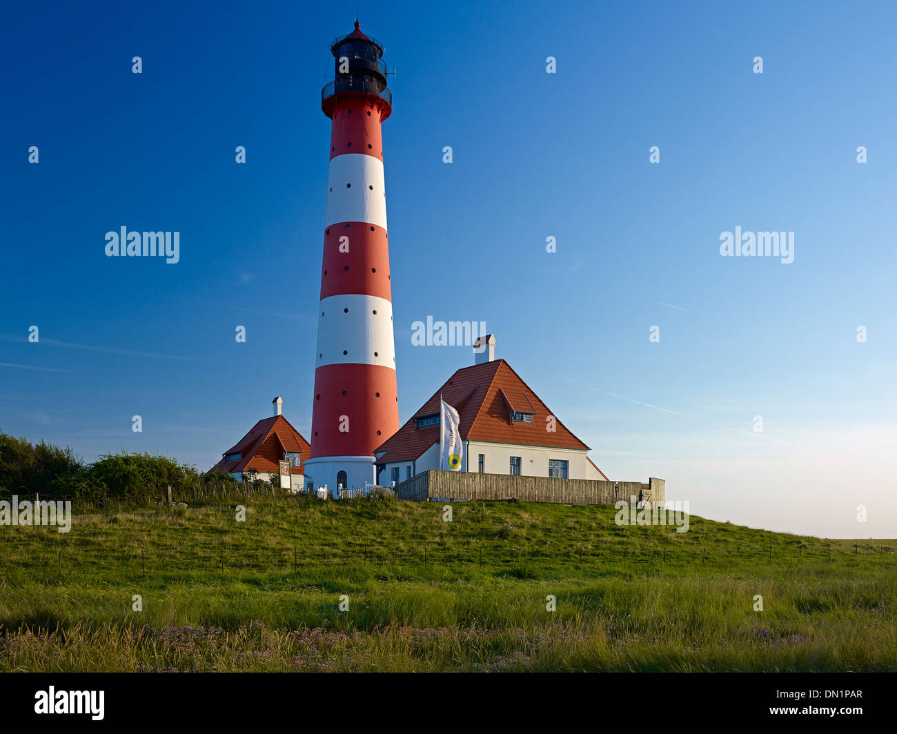 Faro Westerheversand, penisola di Eiderstedt, Frisia settentrionale, Schleswig-Holstein, Germania Foto Stock