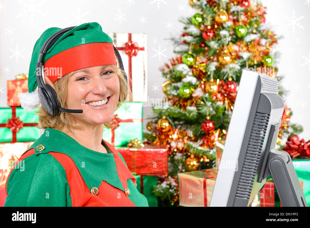 Un membro della elf customer support team pronti a ricevere la vostra chiamata al polo nord. Foto Stock