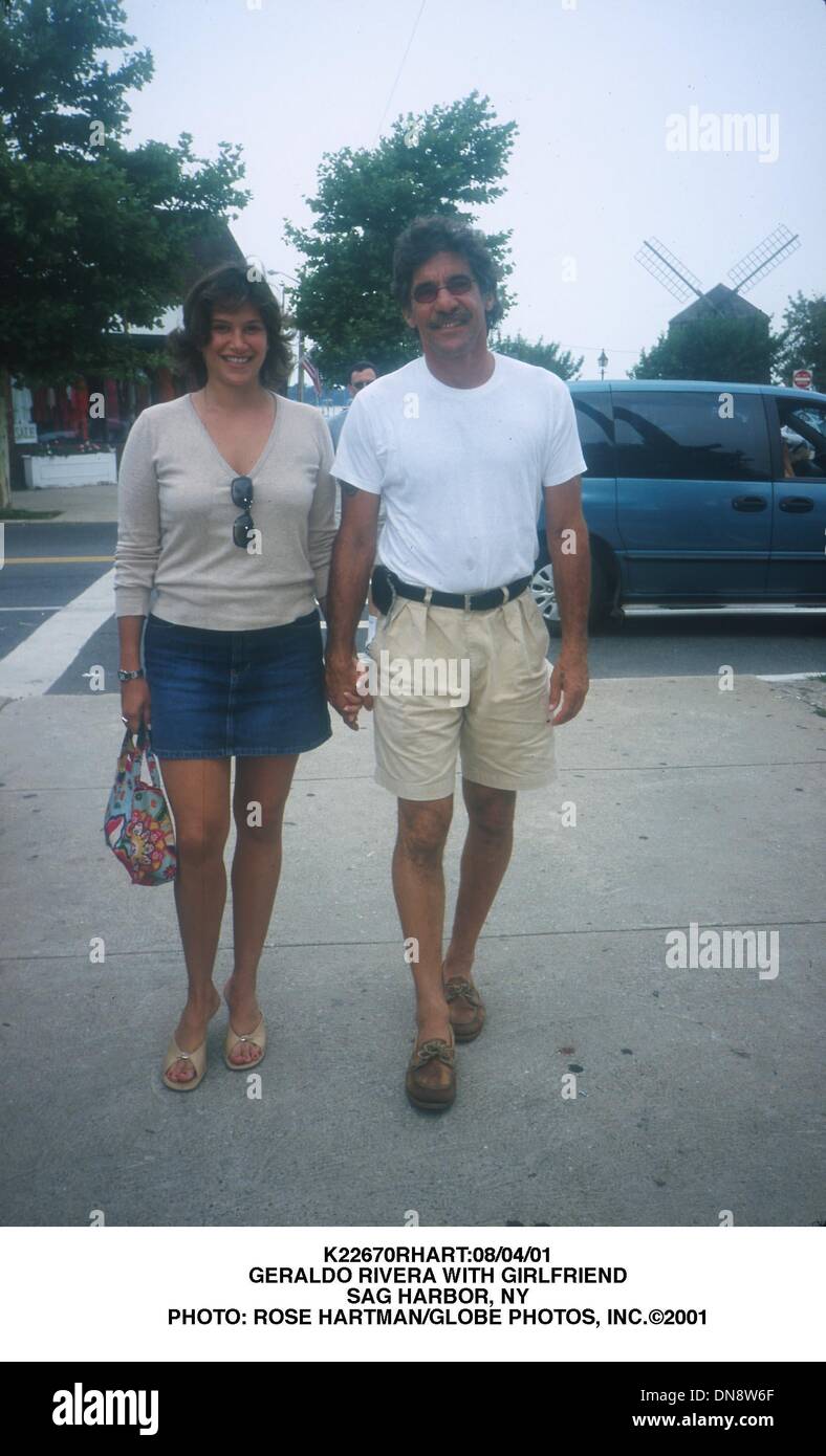 Agosto 4, 2001 - K22670RHART:08/04/01.Geraldo Rivera con la fidanzata.sag harbor, NY. ROSE HARTMAN/ 2001(Credit Immagine: © Globo foto/ZUMAPRESS.com) Foto Stock