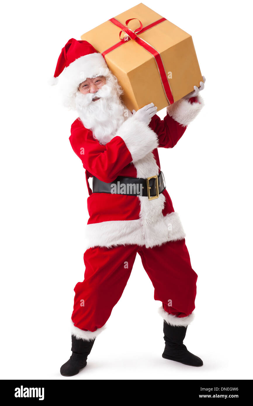 Babbo Natale con le pesanti confezione regalo sullo spallamento Foto Stock