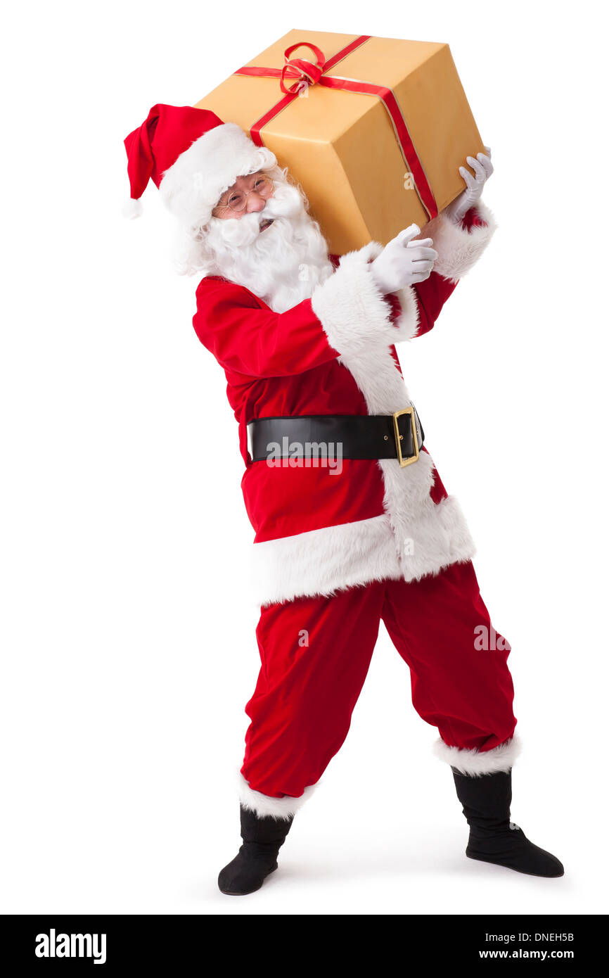 Babbo Natale con le pesanti confezione regalo sullo spallamento Foto Stock