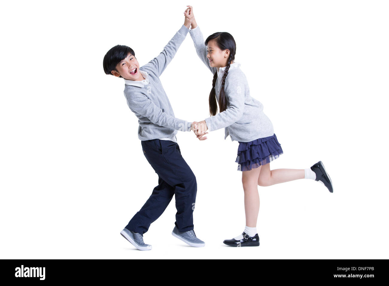 Felice un ragazzo e una ragazza ballare Foto Stock