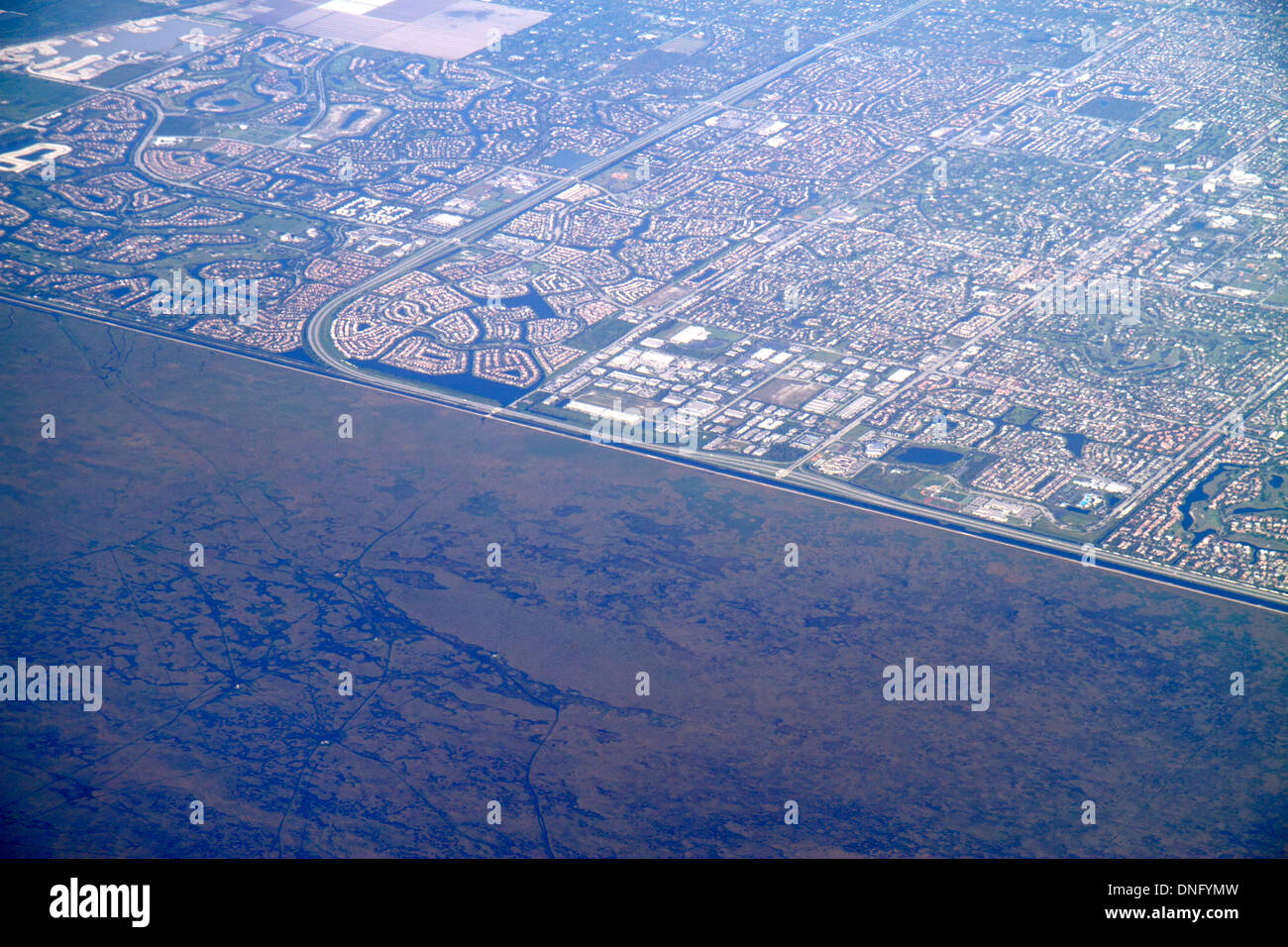 Miami Florida,FL,Sud,Miami Dade County,Miami International Airport,mia,US Airways flight,window seat,airair view,Everglades,developed Land,Coral SPR Foto Stock