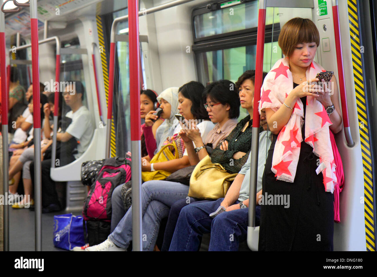 Hong Kong China,HK,Asia,Cinese,Orientale,Metropolitana MTR di Hong Kong,Airport Express,a bordo,cabina passeggeri,treno,cabina passeggeri,giro passeggeri passeggeri Foto Stock