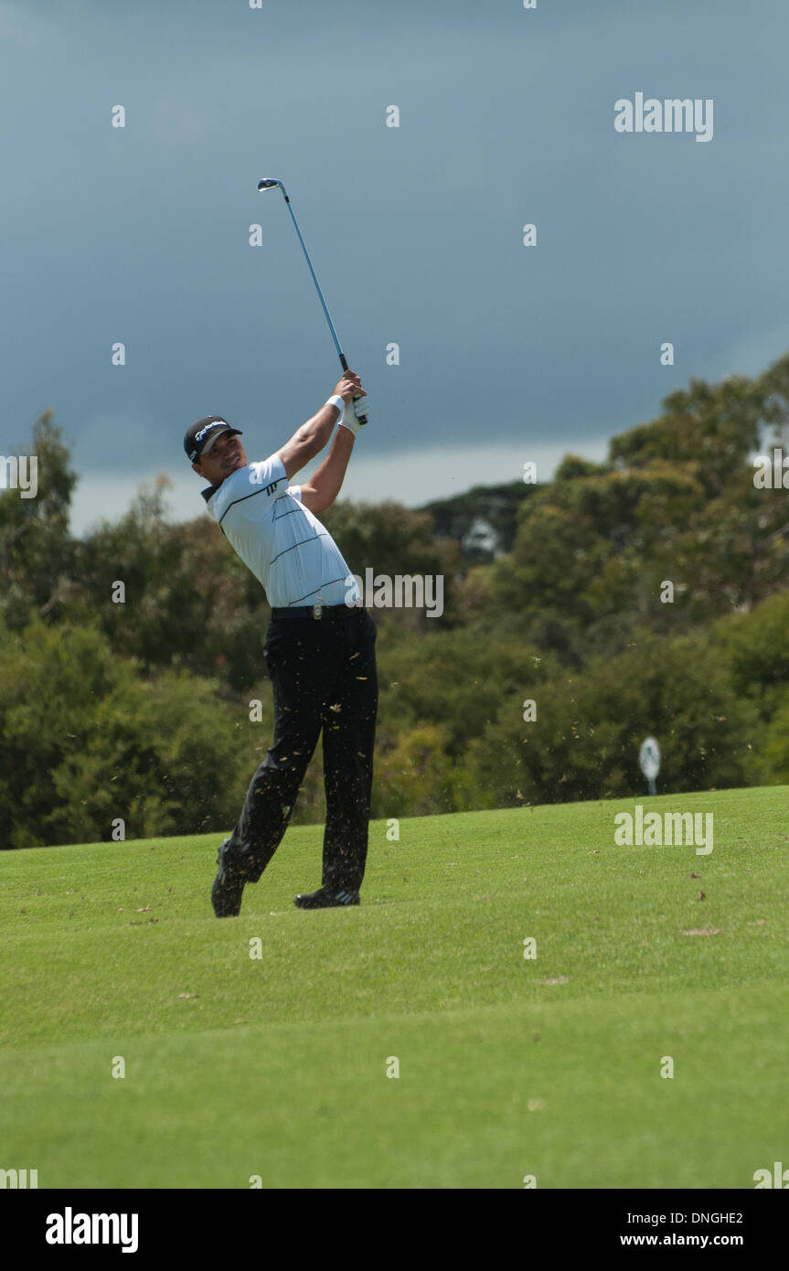 Jason giorno campione del mondo golfista Australia giocando nel Handa World Cup 2013 Royal MElbourne su un fairway shot Foto Stock