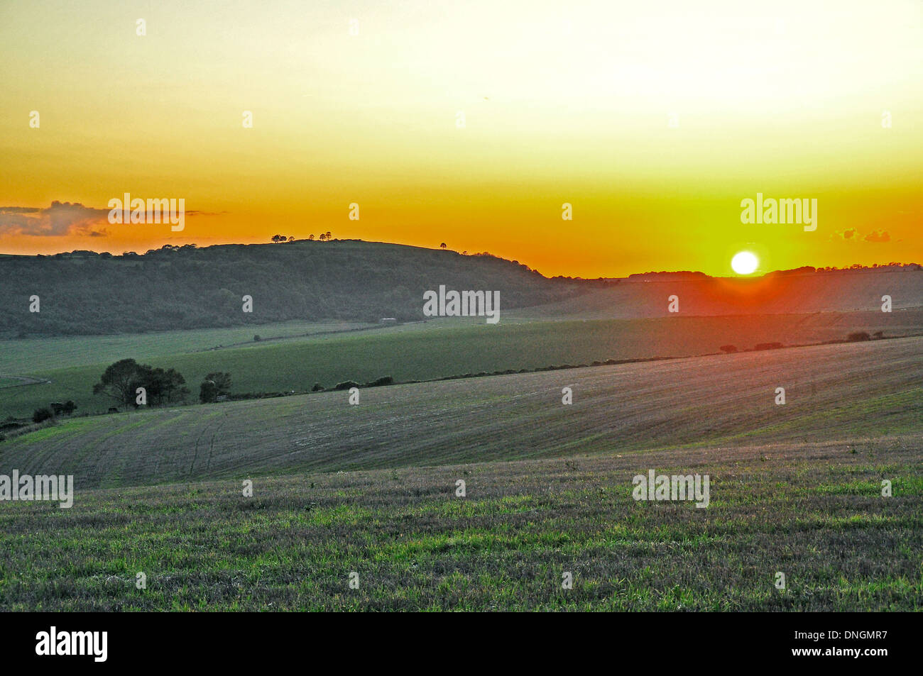 Il tramonto. Guardando ad ovest a Cissbury Ring Foto Stock