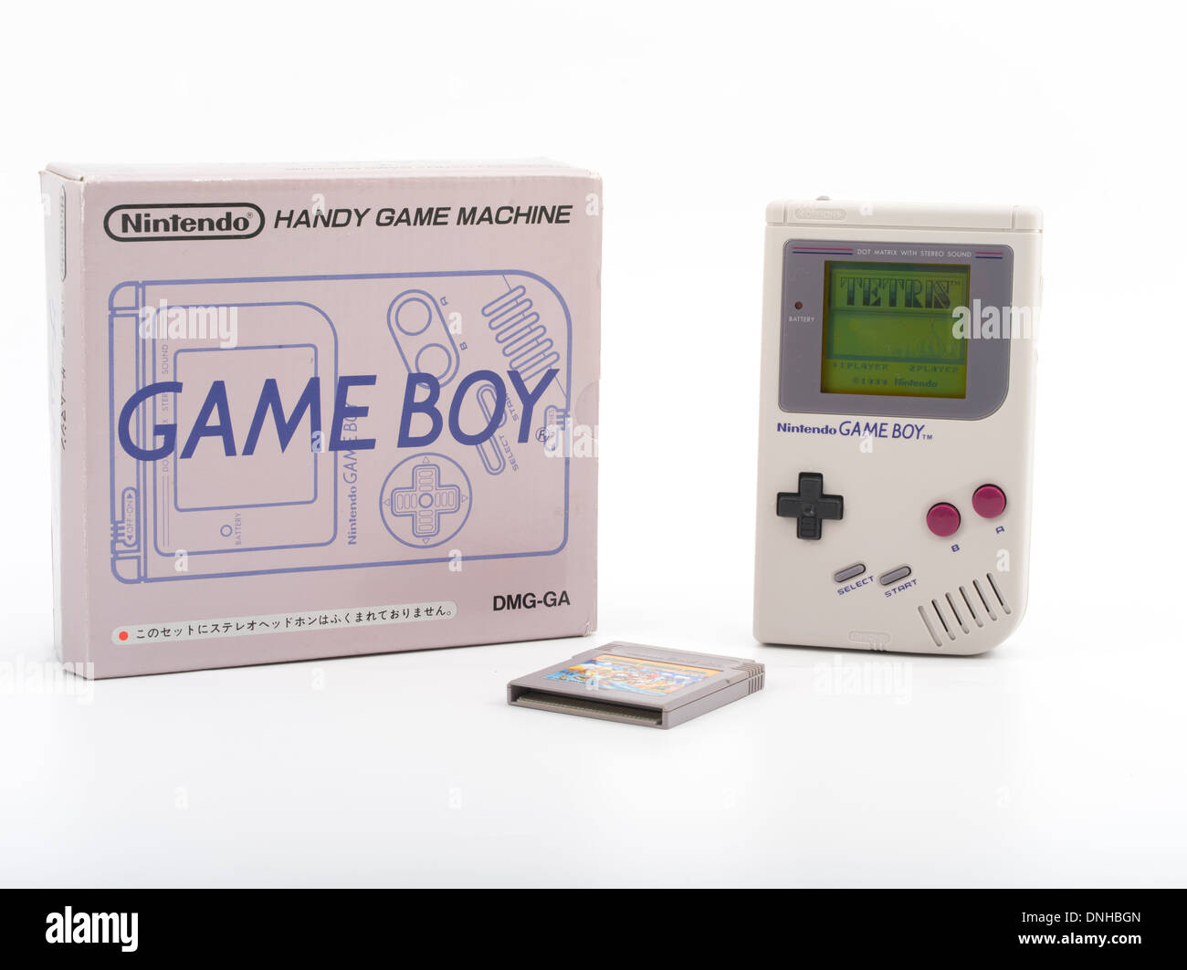 Nintendo Gameboy con mario cartuccia e mostrando tetris gioco sullo schermo. DMG originale-001 versione in grigio chiaro / grigio dal Giappone Foto Stock