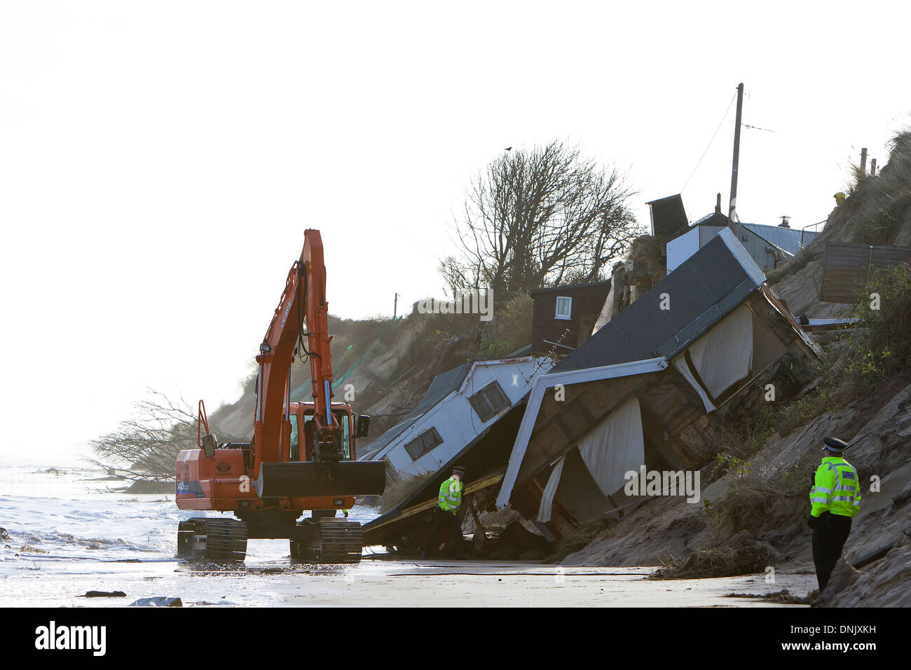 Monitor di polizia pericolo di proprietà collassato e rischio permanente di picchi di marea a Hemsby. Foto Stock