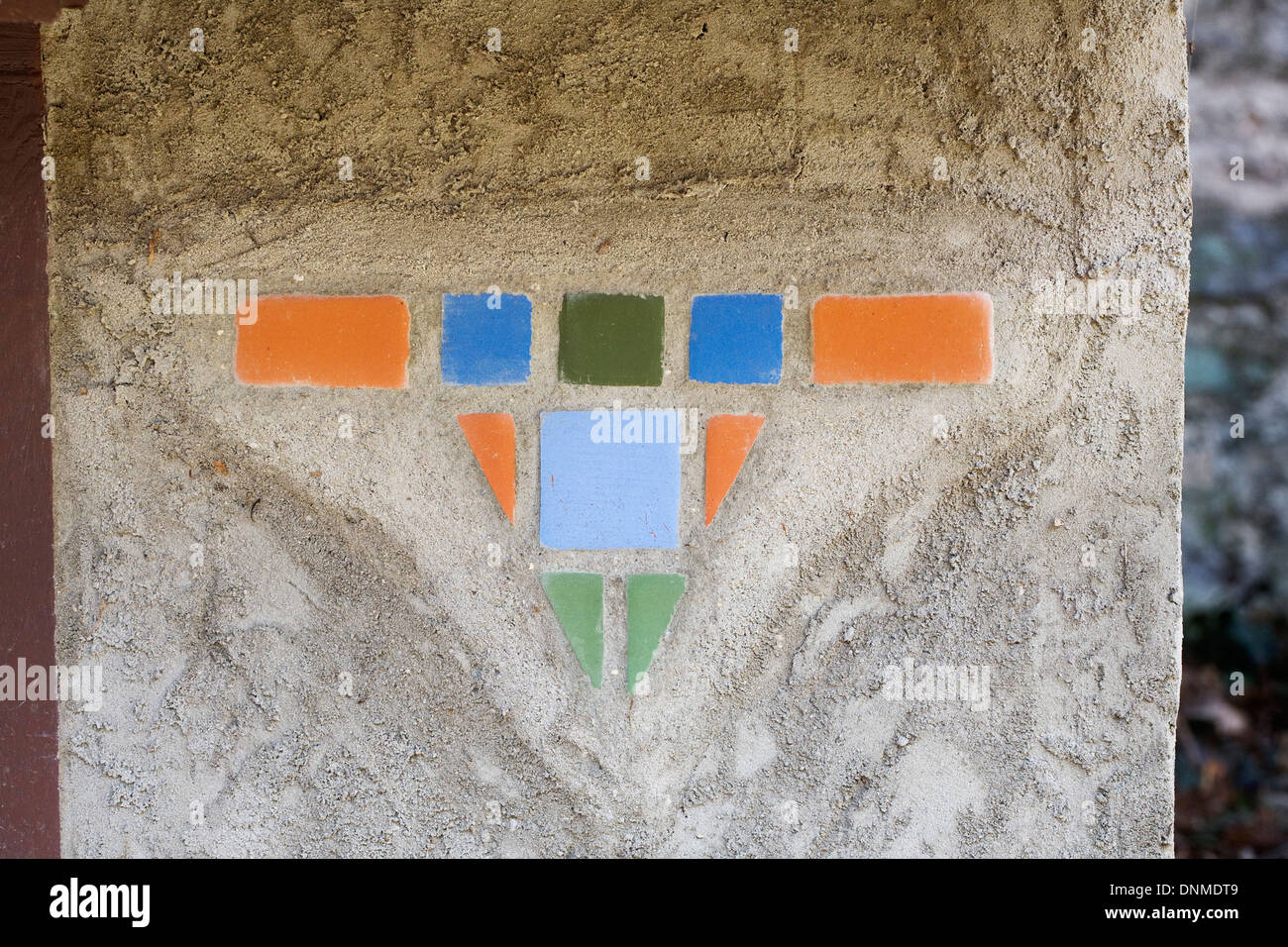 Arti Decorative e artigianato tile pattern su una parete di un edificio. Foto Stock
