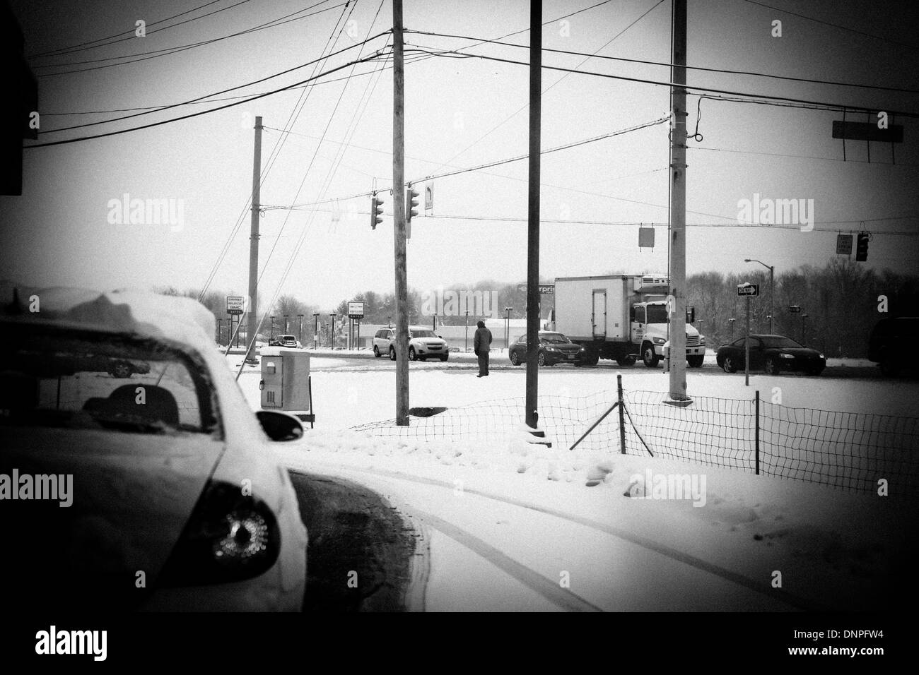 Bloomington, Indiana, Stati Uniti d'America. 01 gen 2014. Cambio di ricambio in Martinsville, a. Il congelamento temeratures e coperta di neve Indiana con temperature sottozero e neve più attesi nel corso del fine settimana. Credito: Jeremy Hogan/Alamy Live News Foto Stock