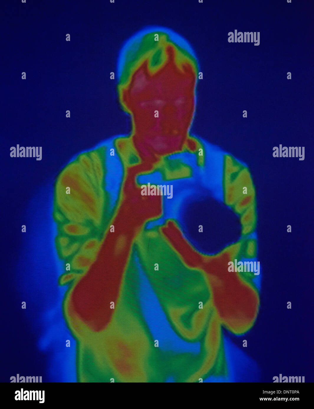 Ritratto di fotografo da o termografica a infrarossi - termocamera Foto Stock
