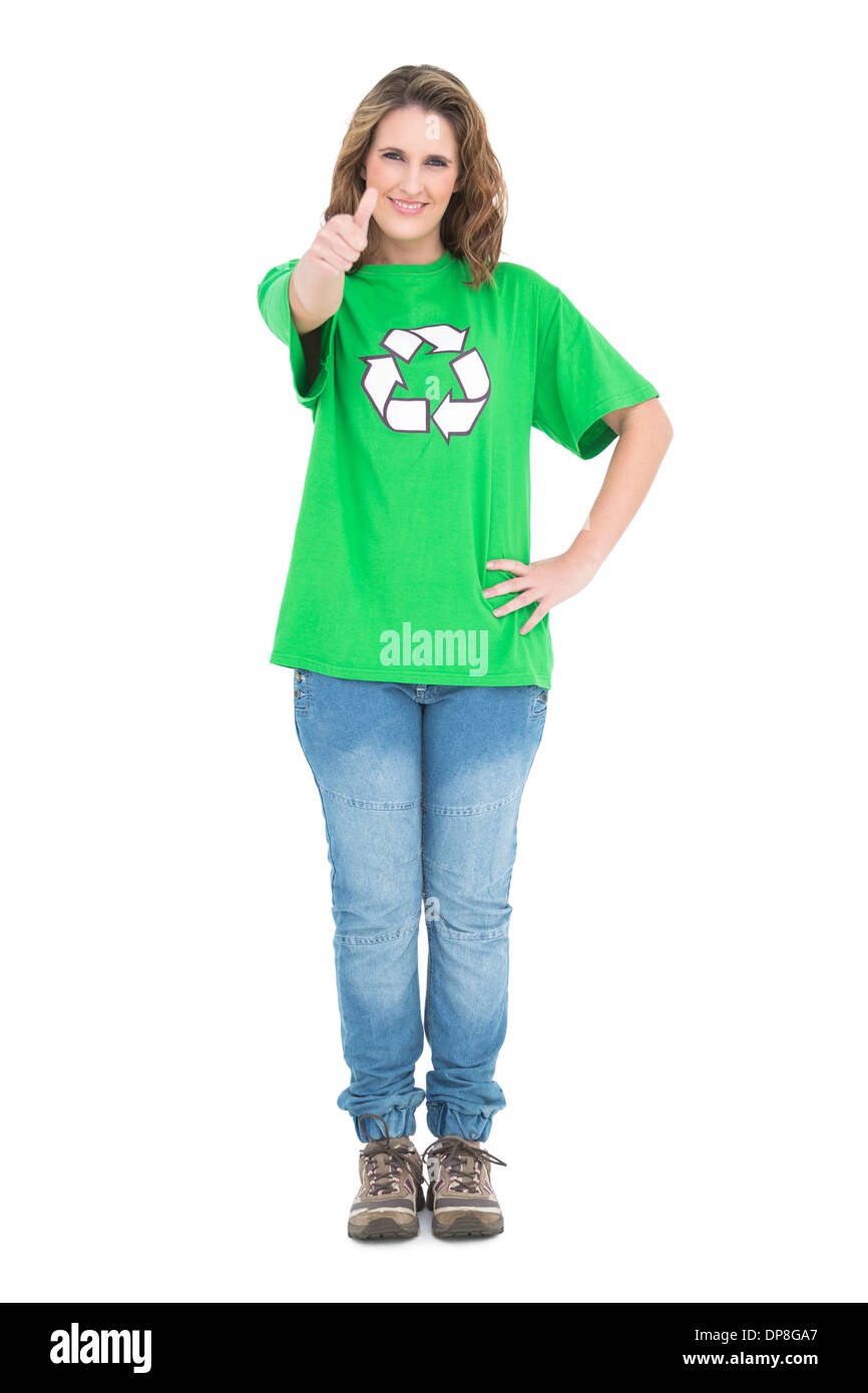 Bella donna di volontariato con il pollice in alto Foto Stock