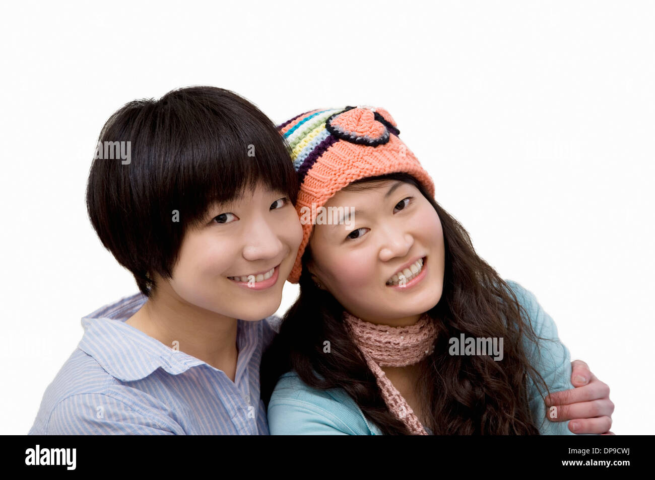 Ritratto di felice fratello e sorella su sfondo bianco Foto Stock