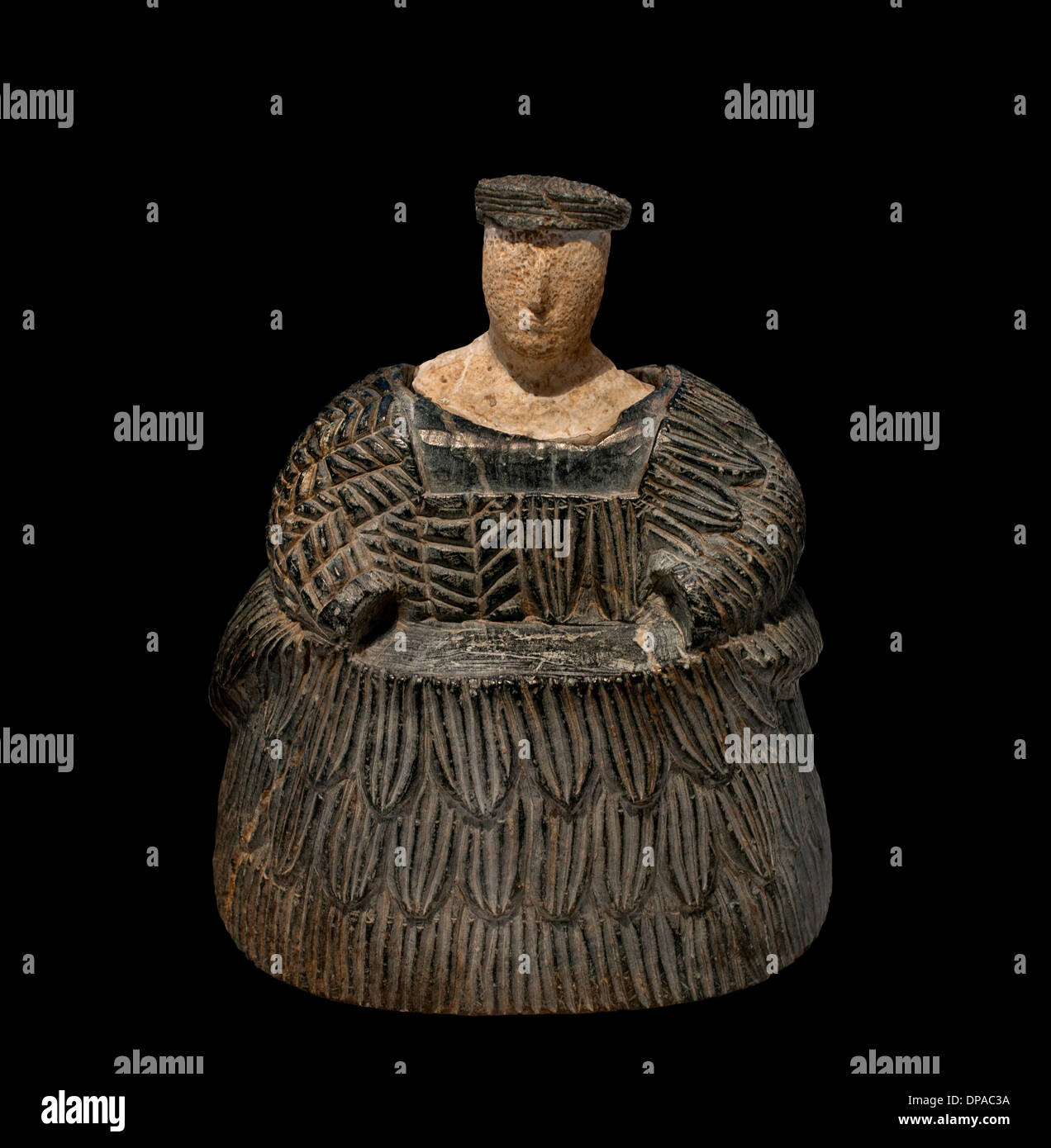 Donna che indossa un vestito di lana di rivestimento (kaunakes) figura protettiva dei morti viventi e civiltà oxus (Afghanistan) 2300-1700 A.C. Foto Stock