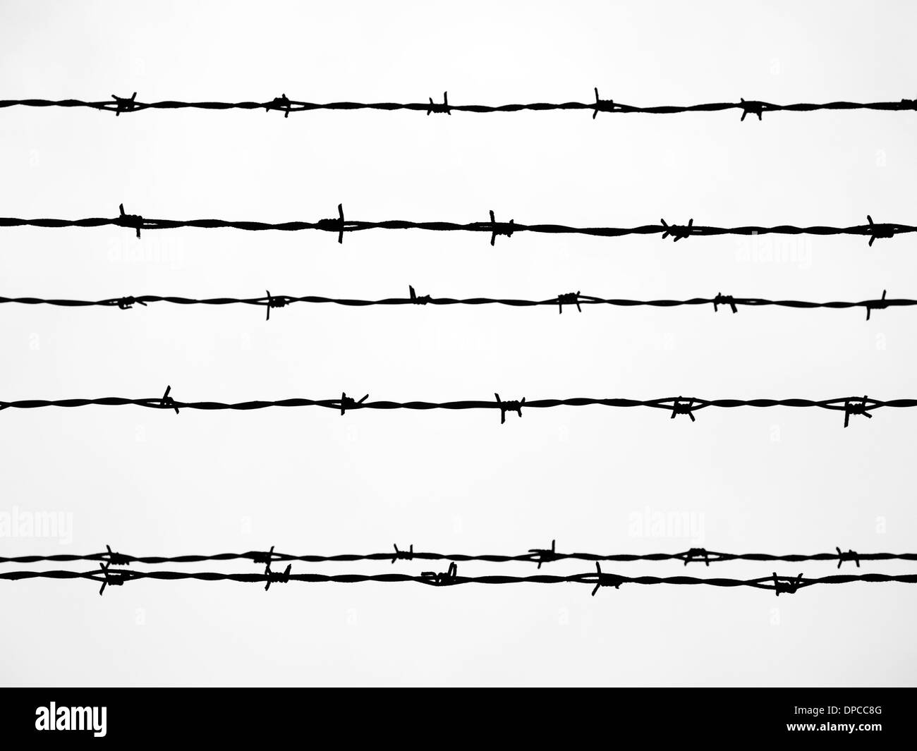 Filo spinato al campo di concentramento di Auschwitz in Polonia Foto Stock