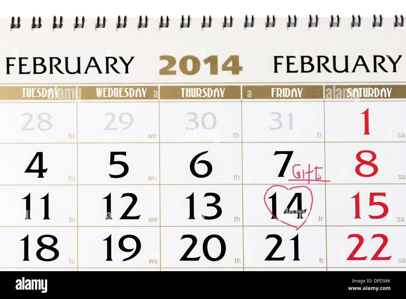 Pagina del calendario con cuore rosso il 14 febbraio 2014. Primo piano. Foto Stock