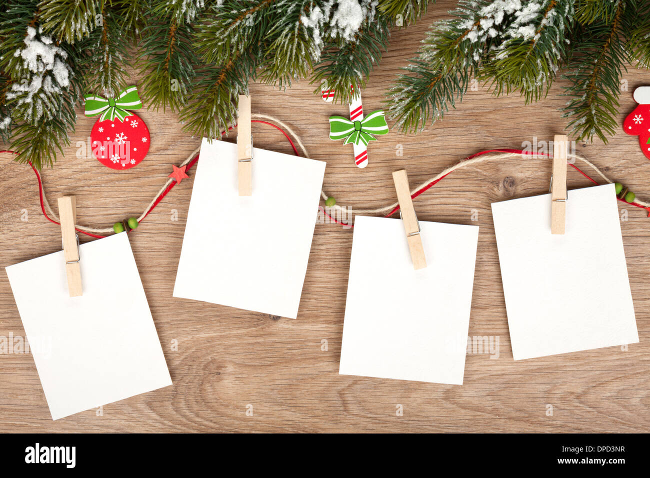Bianco Natale cornici fotografiche con abete e decorazioni Foto Stock