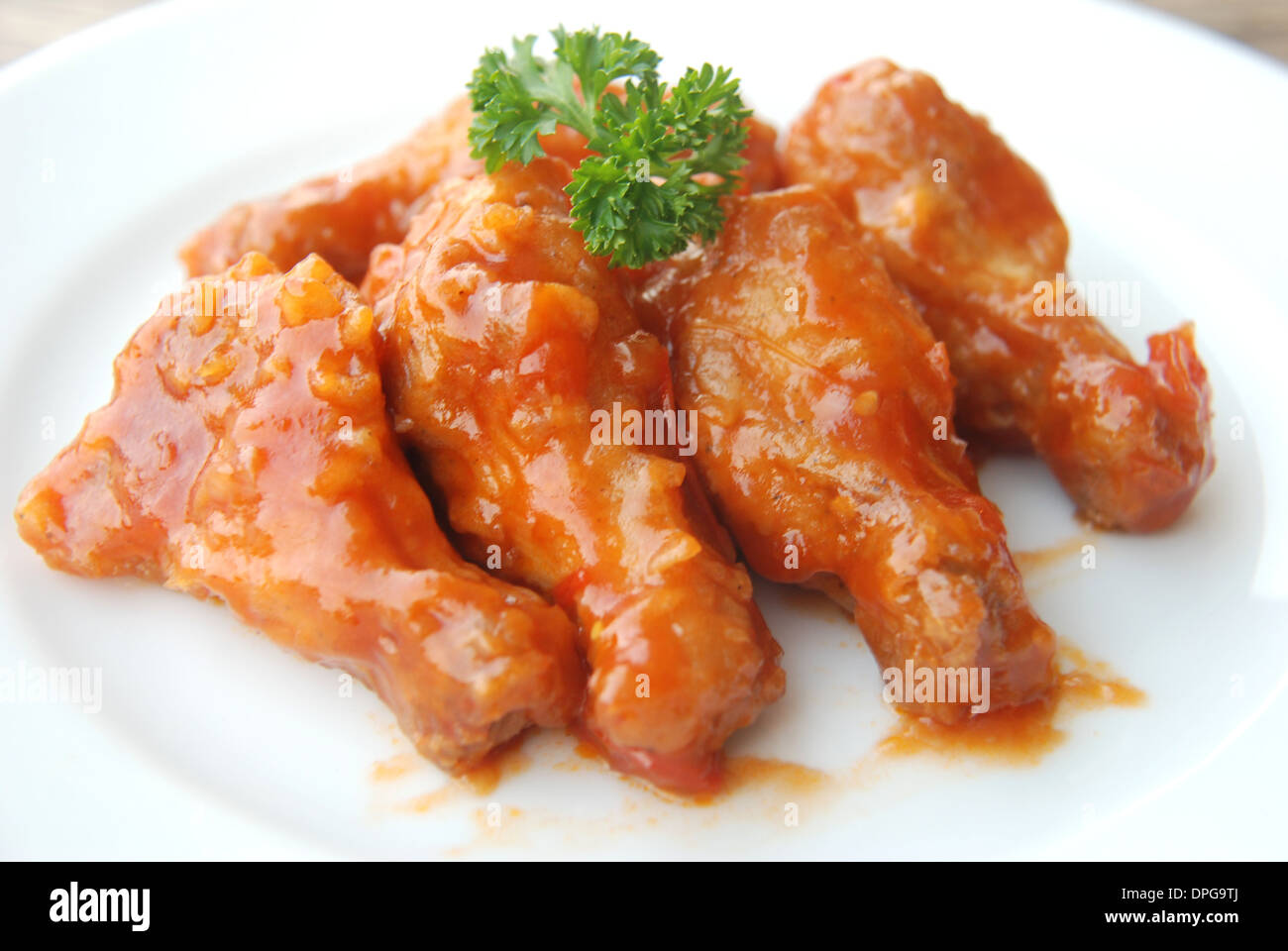 Coscia di pollo miscelata dolce salsa asiatica Foto Stock