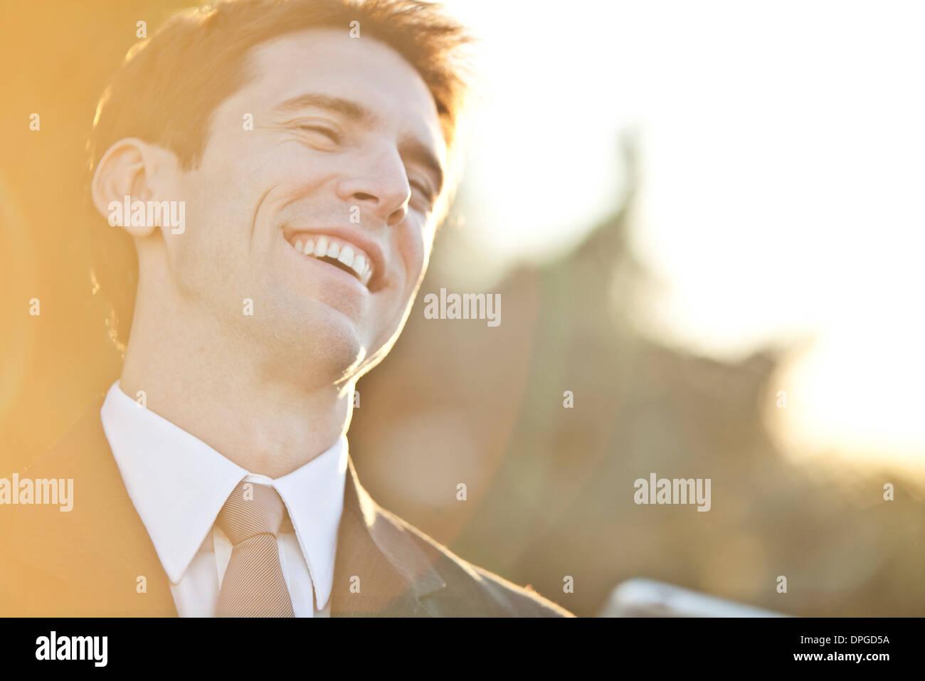 Imprenditore ridendo, ritratto Foto Stock