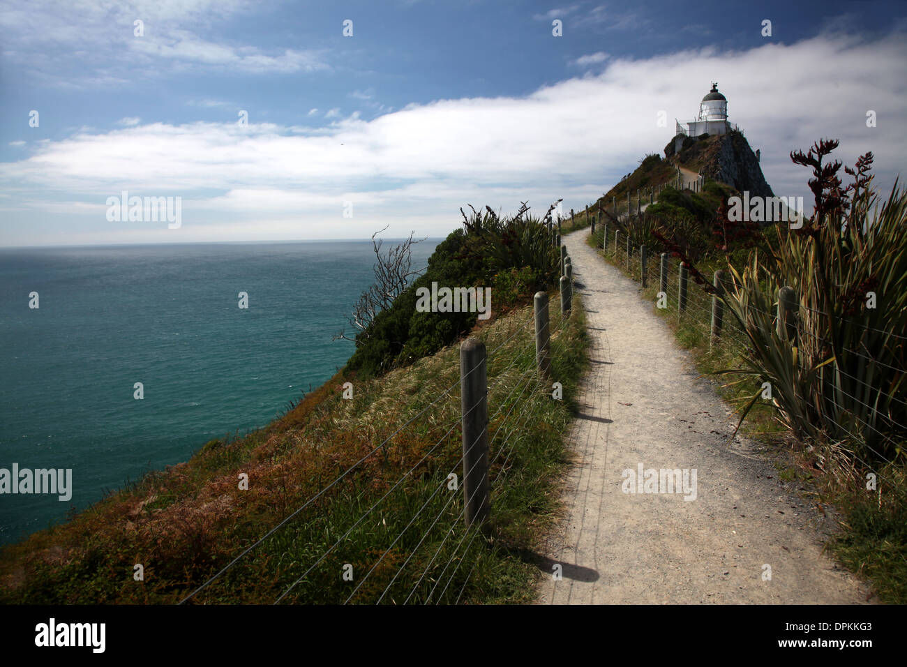 Un faro in remoto in una posizione spettacolare Foto Stock