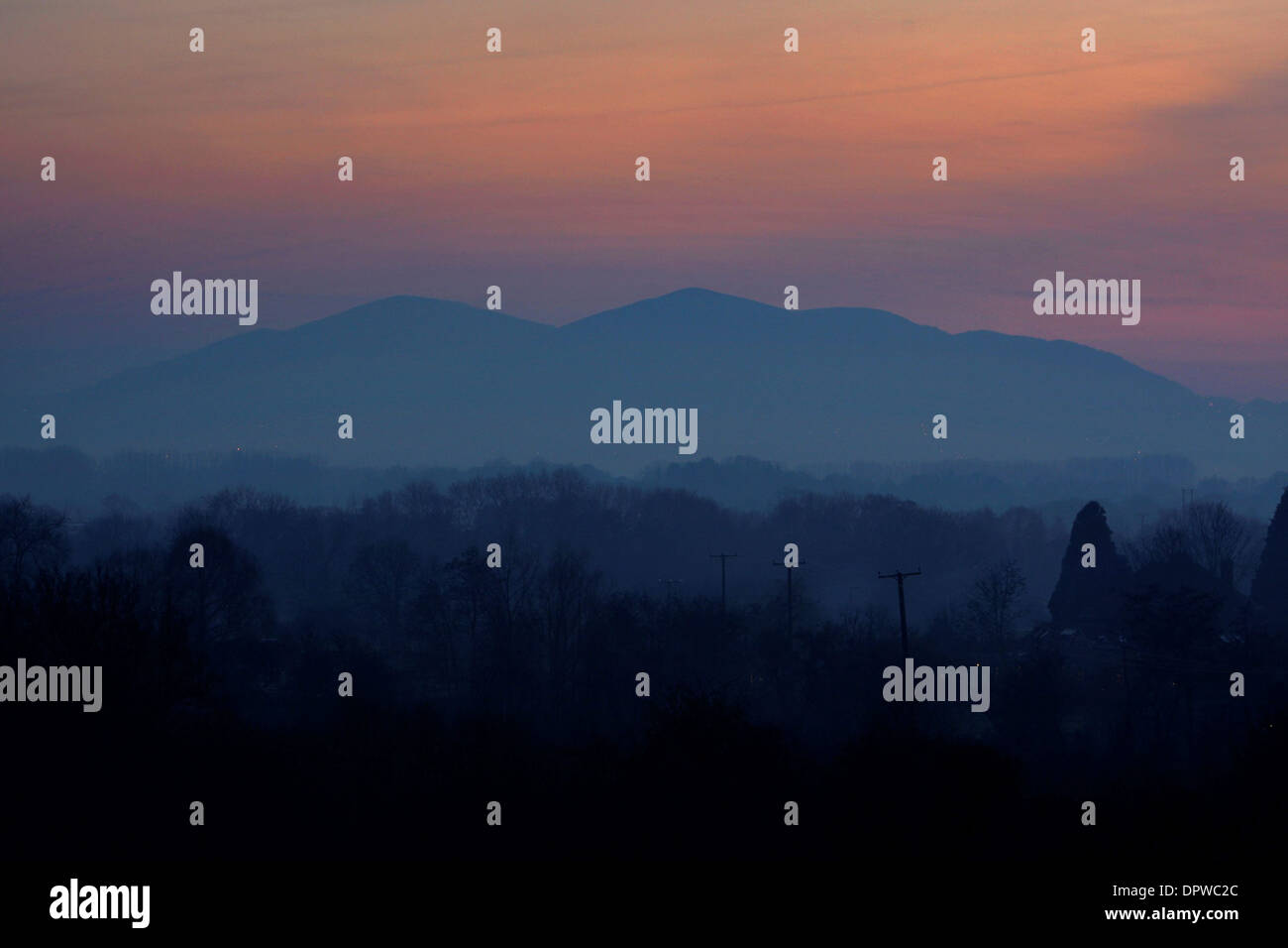 Il sole tramonta su Malvern Hills Foto Stock