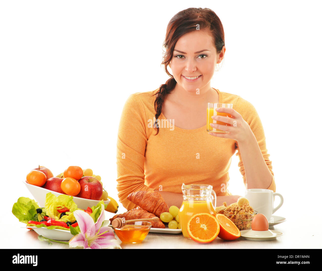 Giovane donna con prima colazione. Alimentazione equilibrata Foto Stock