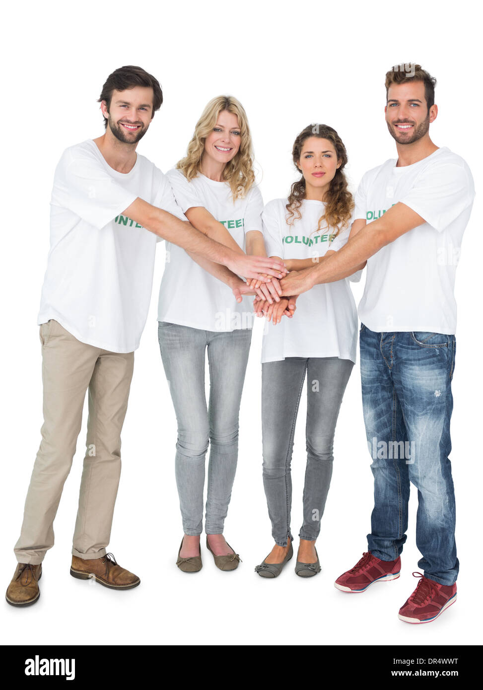 Ritratto di gruppo di volontari felice con le mani insieme Foto Stock Ritratto di gruppo di volontari felice con le mani insieme Foto Stock