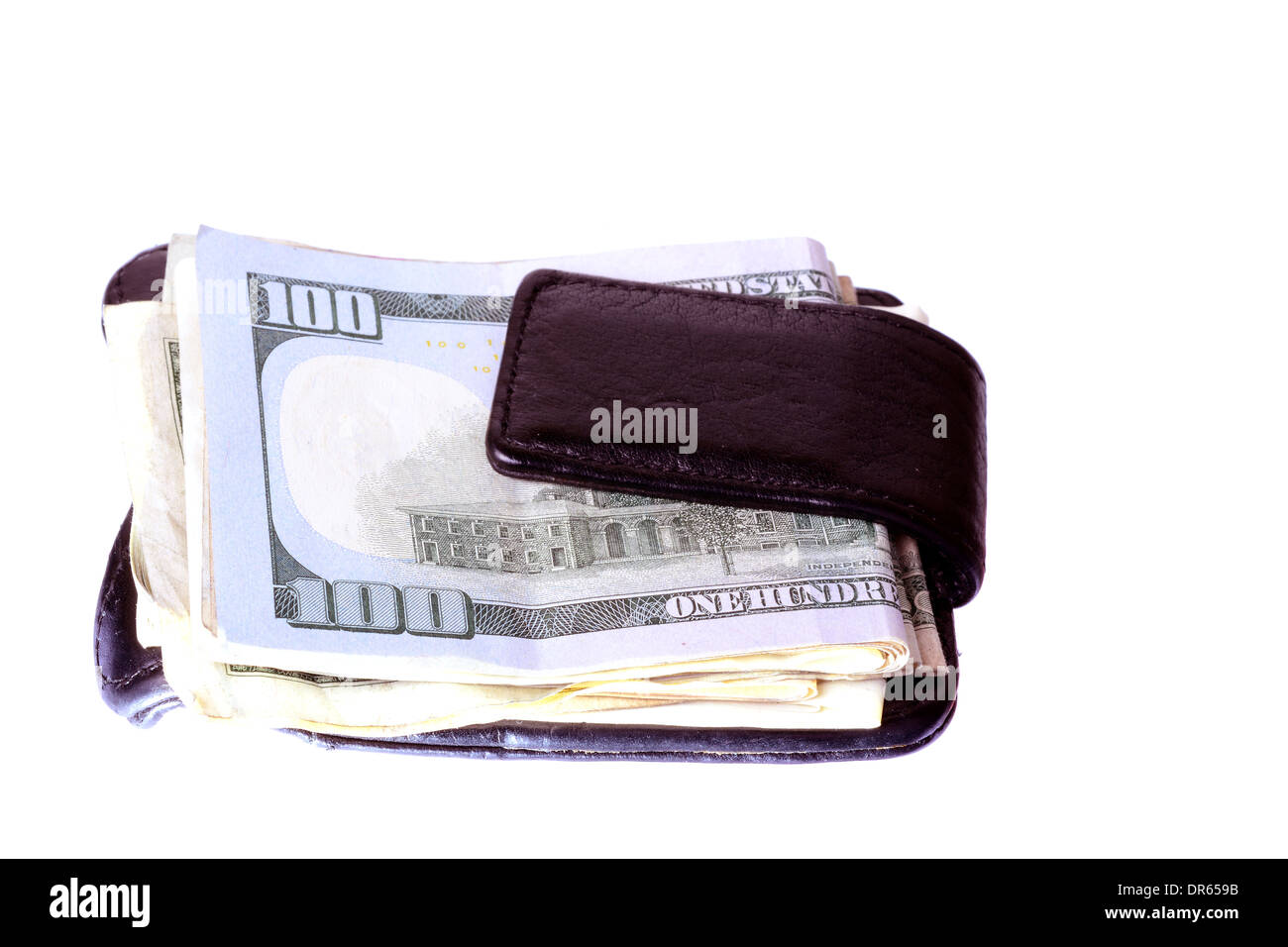 Ripresa macro di un clip di denaro con dollari in esso su sfondo bianco Foto Stock