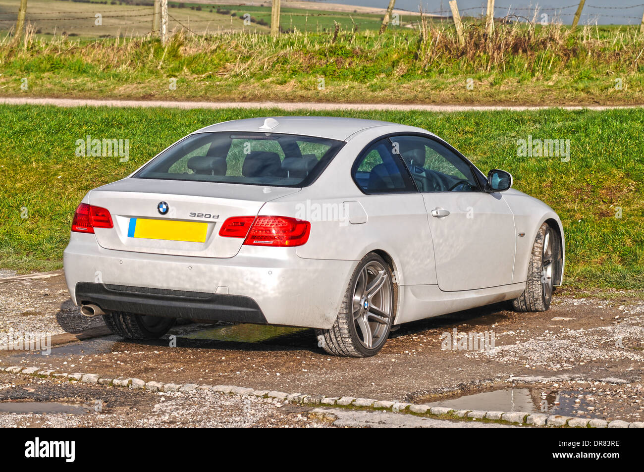 White BMW 320D in effetto HDR Foto Stock