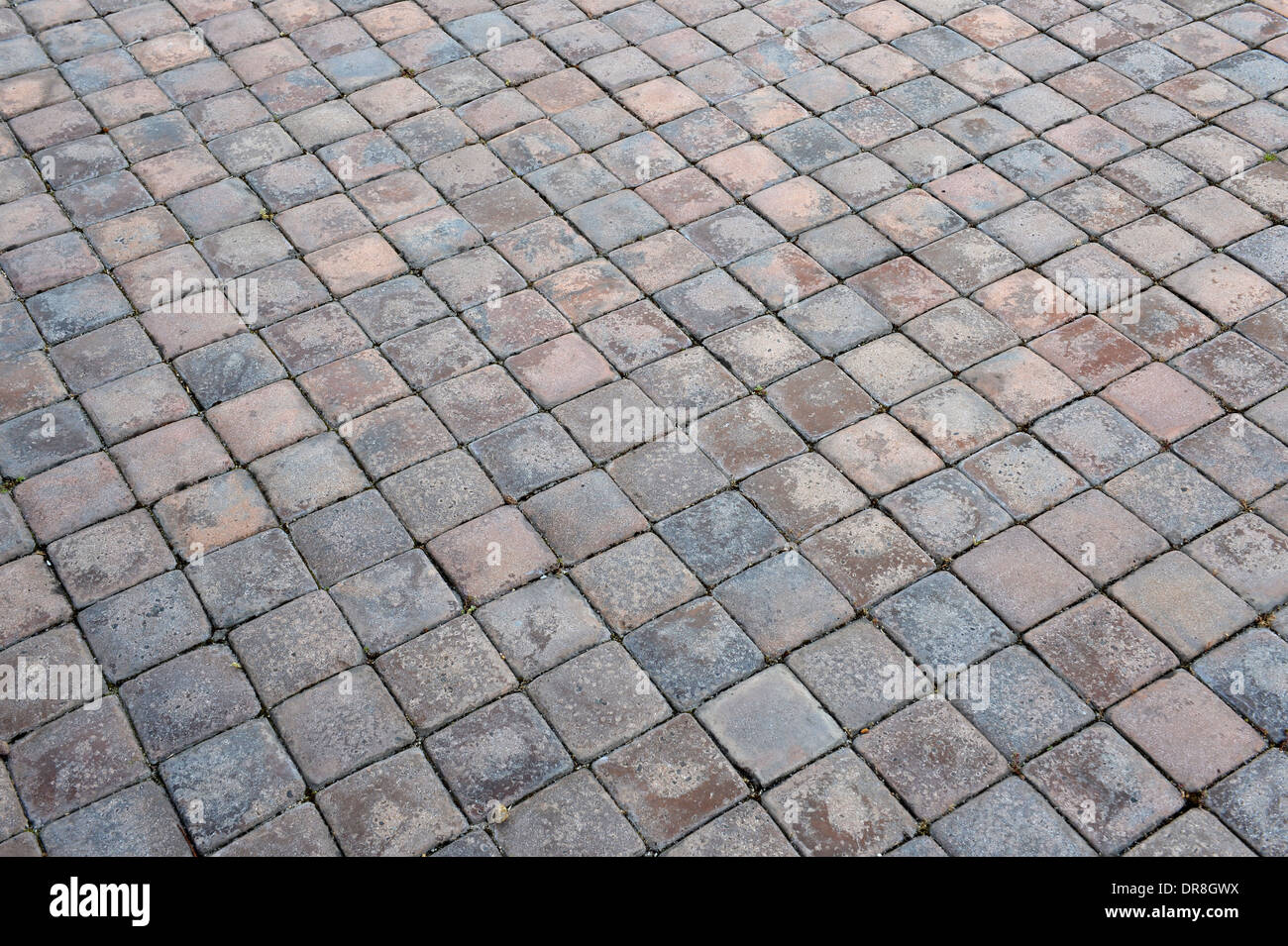 Una chiusura esterna di pavimentazione in mattoni Foto Stock