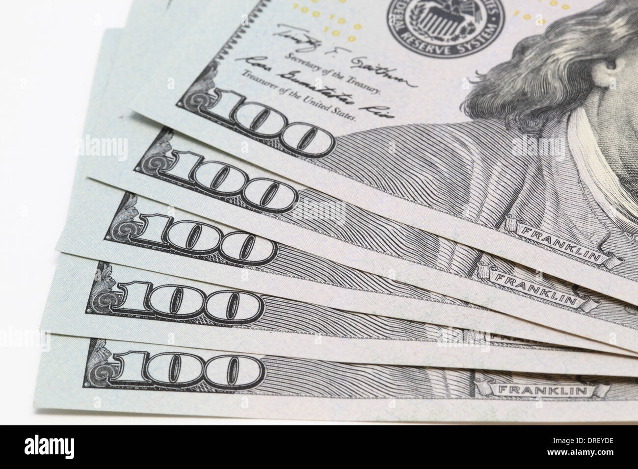 100 le fatture del dollaro isolati su sfondo bianco closeup Foto Stock