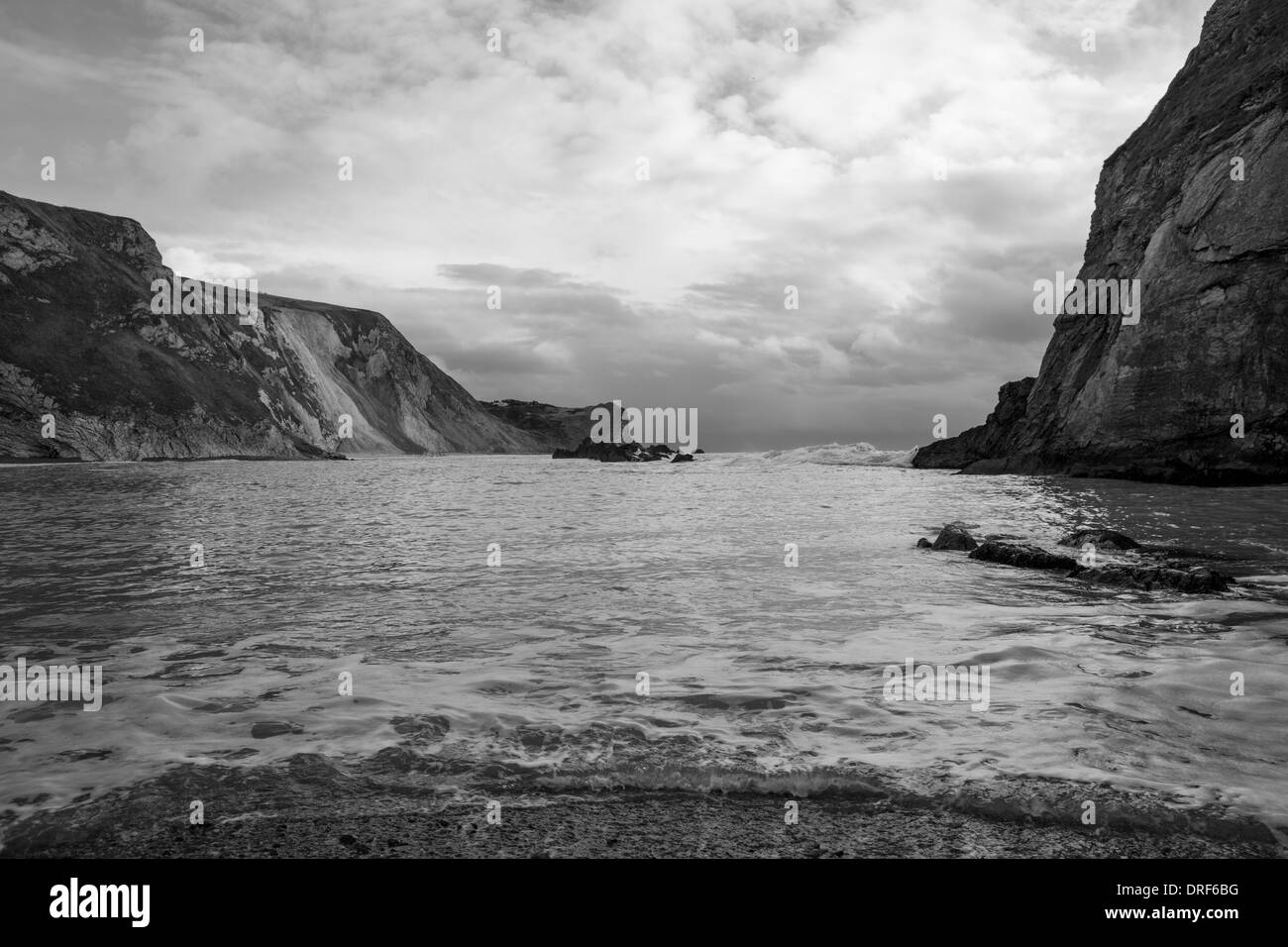 Uomo di guerra Bay e UOMO O'guerra Cove accanto alla porta di Durdle su Jurassic Coast nelle vicinanze Lulworth in Dorset, Inghilterra. Foto Stock