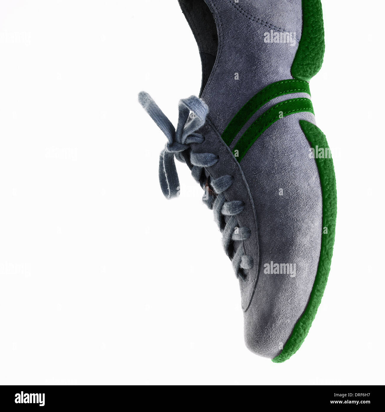 Unico sneaker o trainer lacci della scarpa verde suola Foto Stock