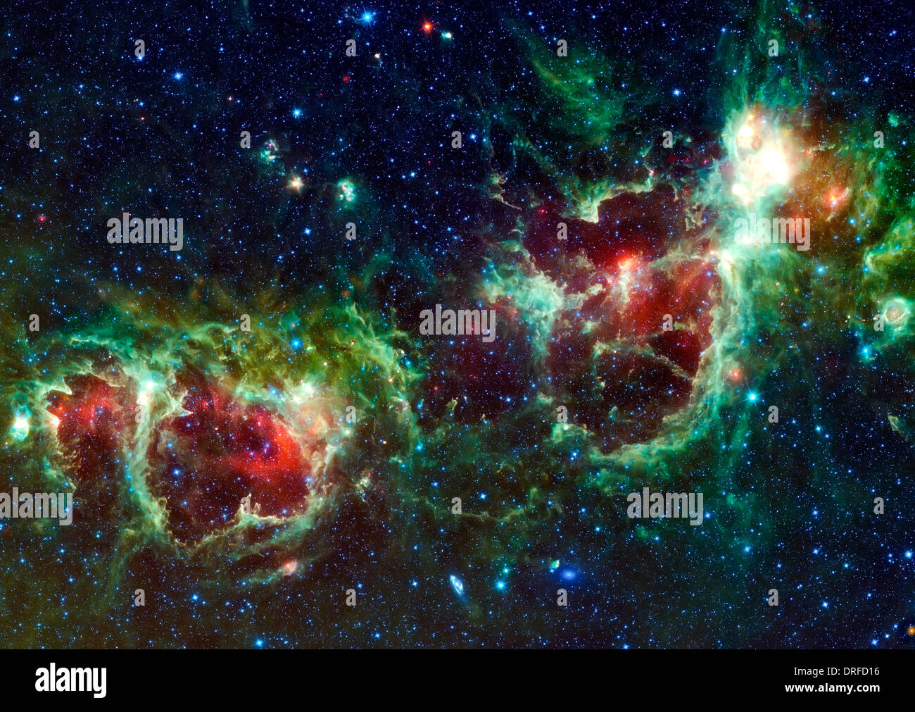 NASA di ampio campo di indagine a infrarossi Explorer immagine di un enorme mosaico di due nuvole gorgogliamento nello spazio conosciuto come anima e cuore Nebulosa Foto Stock