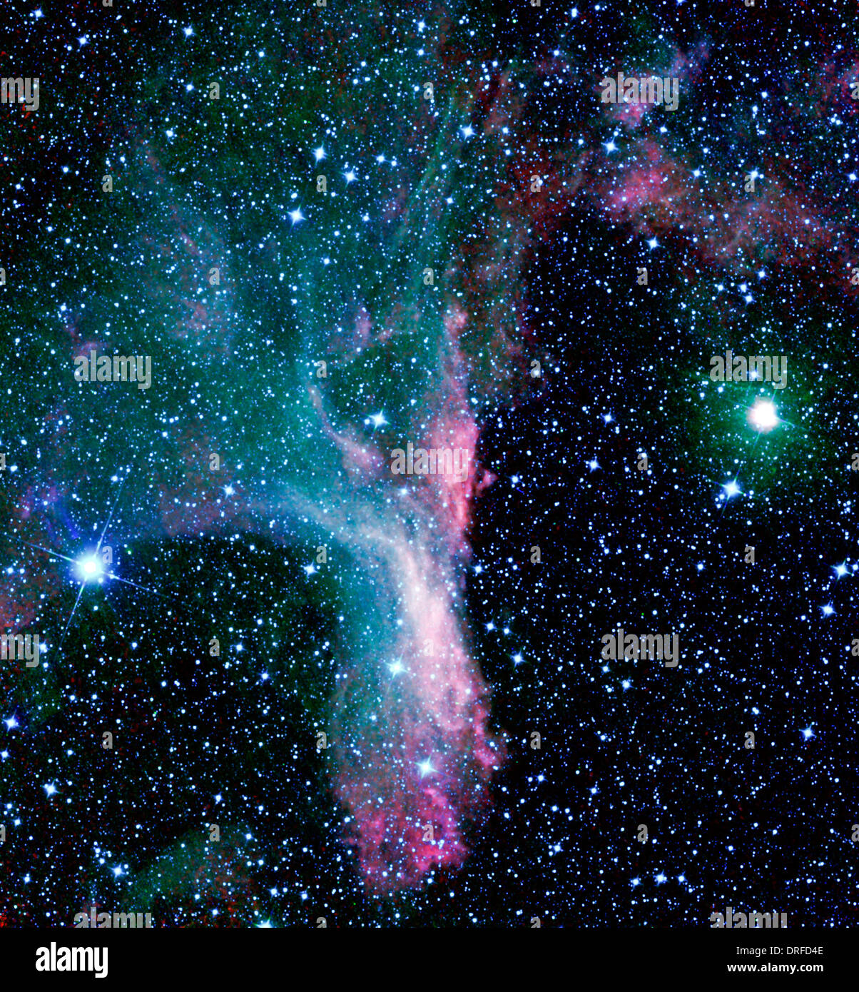 Afferrata in artiglio della costellazione dello Scorpione sorge la nebulosa di riflessione DG 129, una nube di gas e polvere che riflette la luce Foto Stock