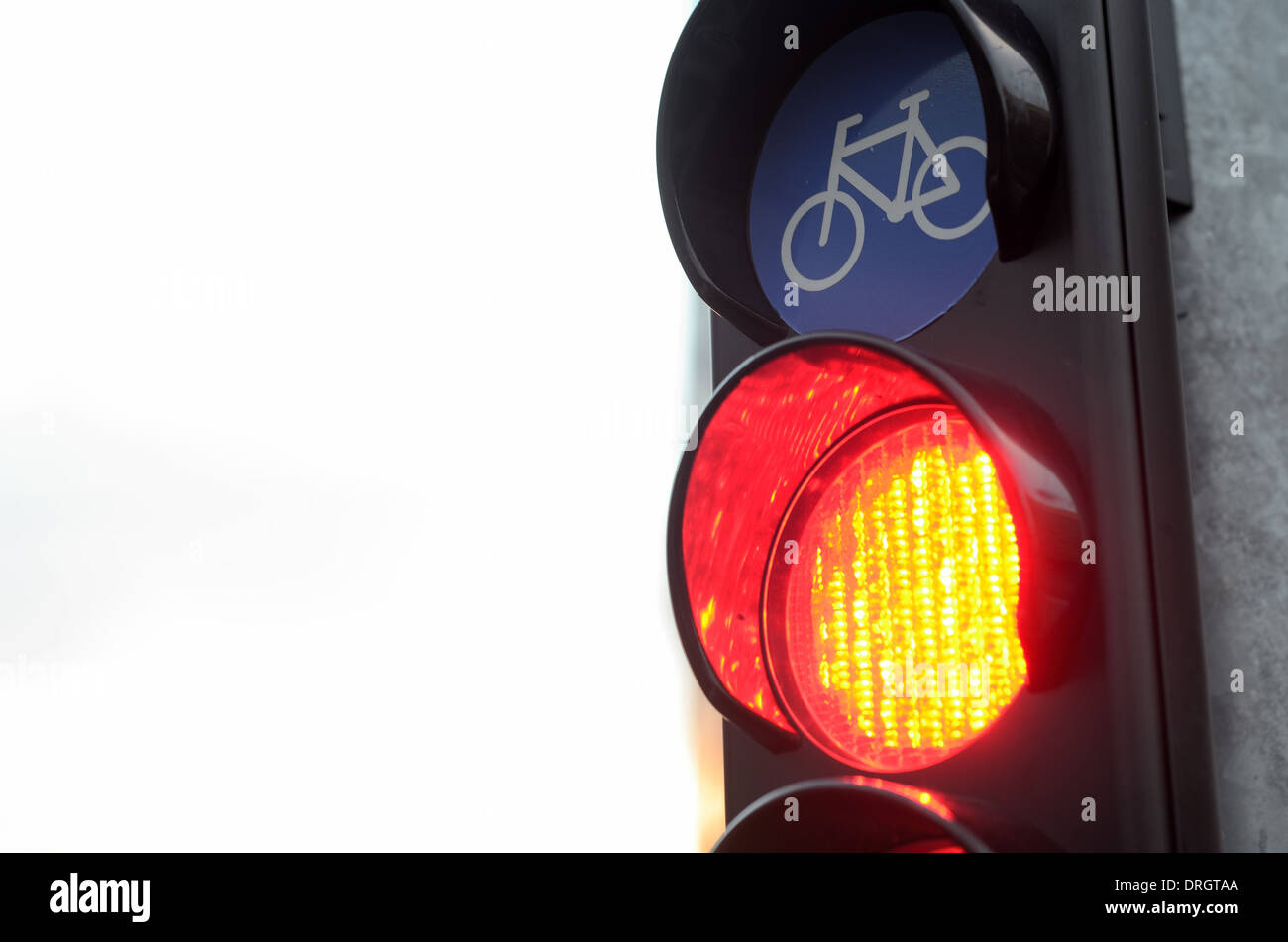 Luce rossa per il traffico di biciclette al bivio Foto Stock