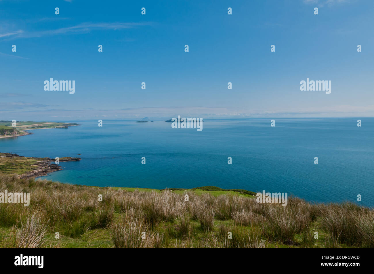 Vista ovest attraversando la baia a Southend nr Campbeltown Mull of Kintyre Argyll & BUte Scozia con Sanday & Ailsa Craig in background Foto Stock