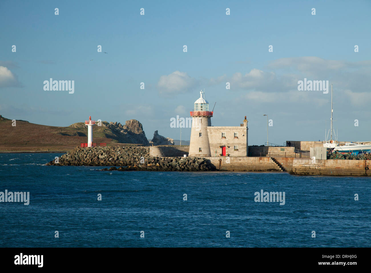 Howth Faro del porto risale al 1817, la penisola di Howth, County Dublin, Irlanda. Foto Stock