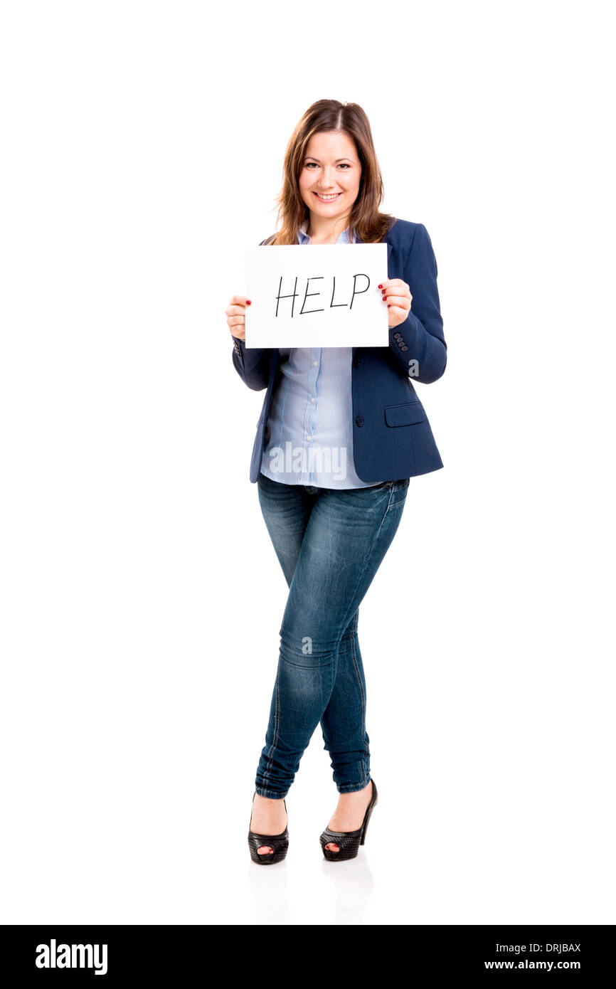 Business donna in possesso di una carta con la parola help, isolato su sfondo bianco Foto Stock