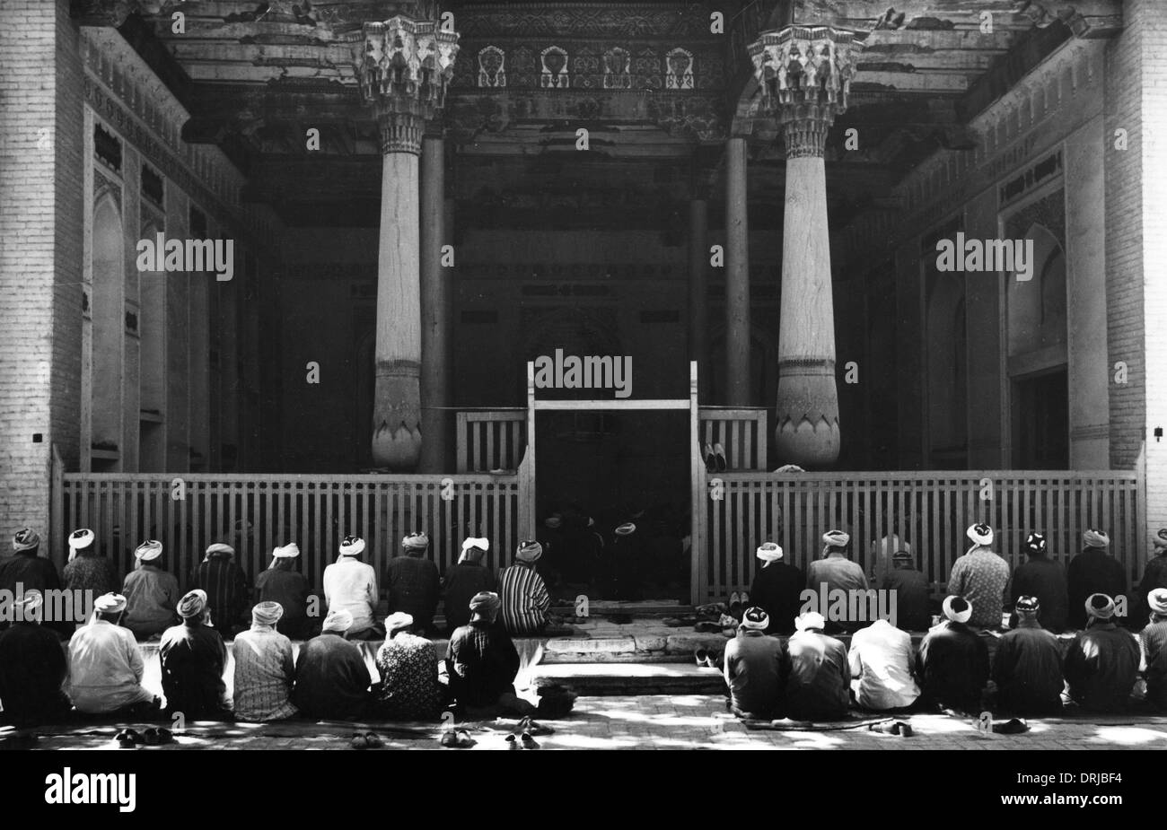 Uzbeki pregando, Samarcanda, Asia centrale Foto Stock