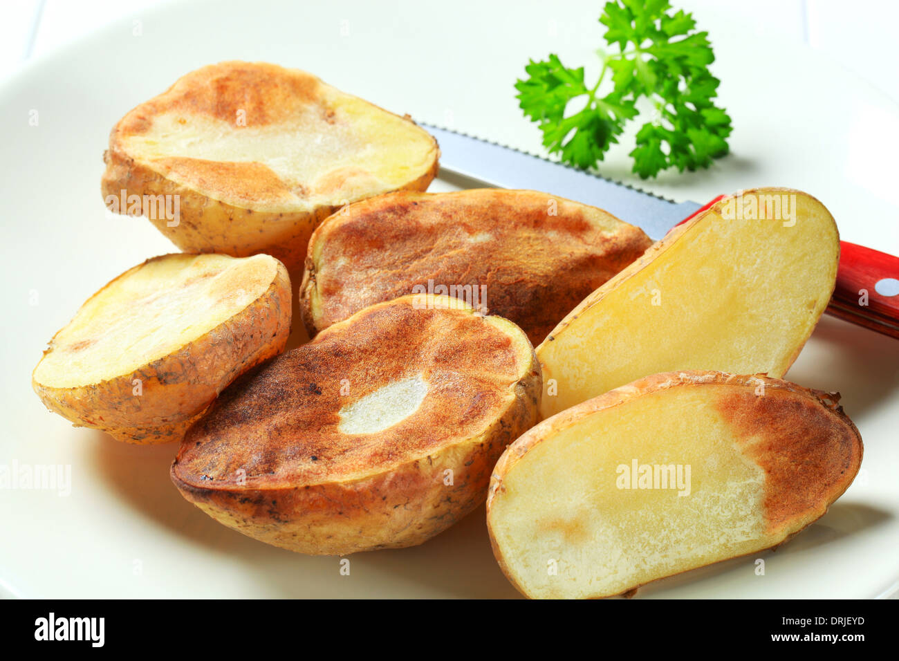 Dimezzato forno-patate arrostite sulla piastra Foto Stock