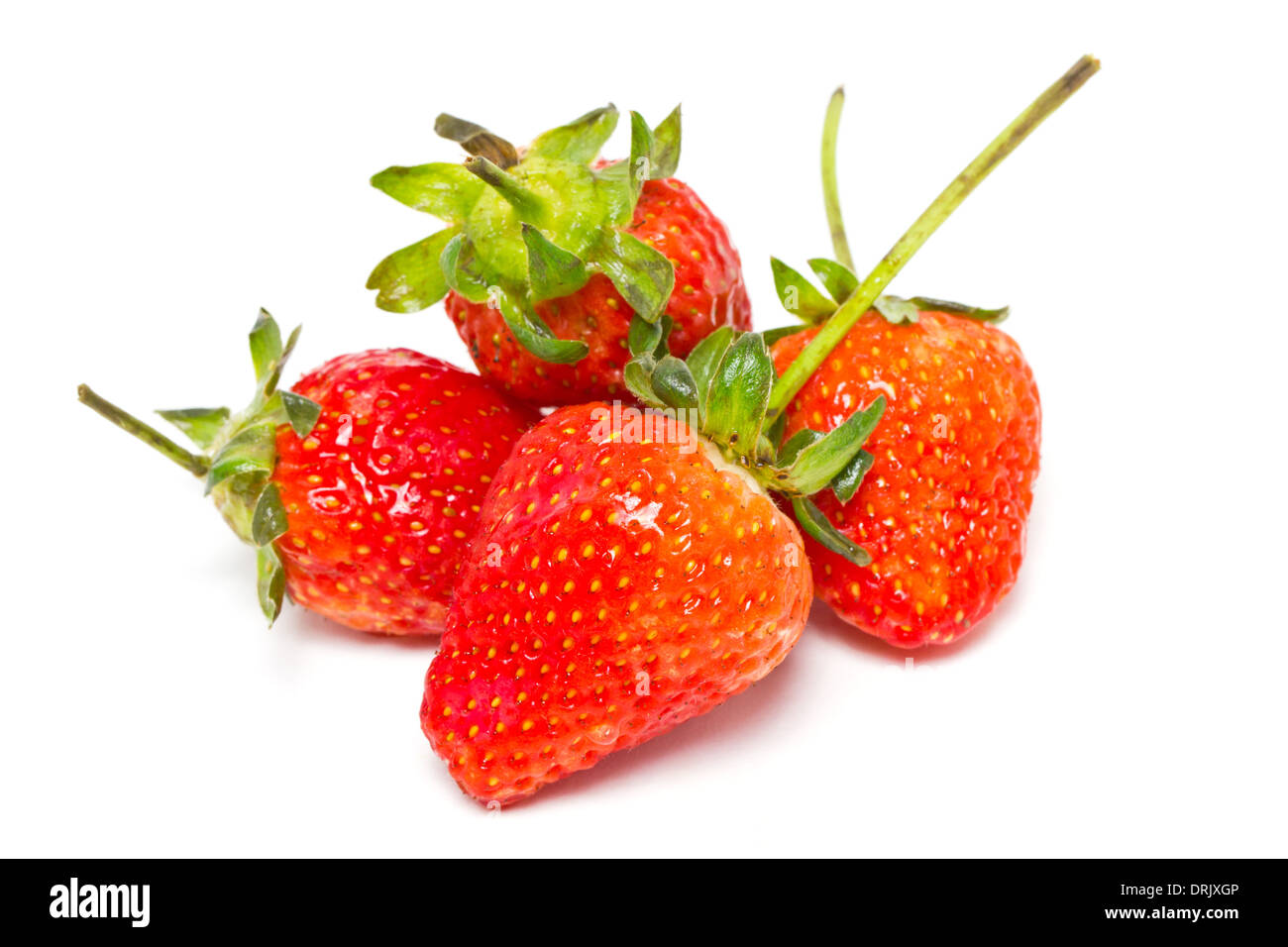 Frutti di fragola isolati su bianco. Foto Stock