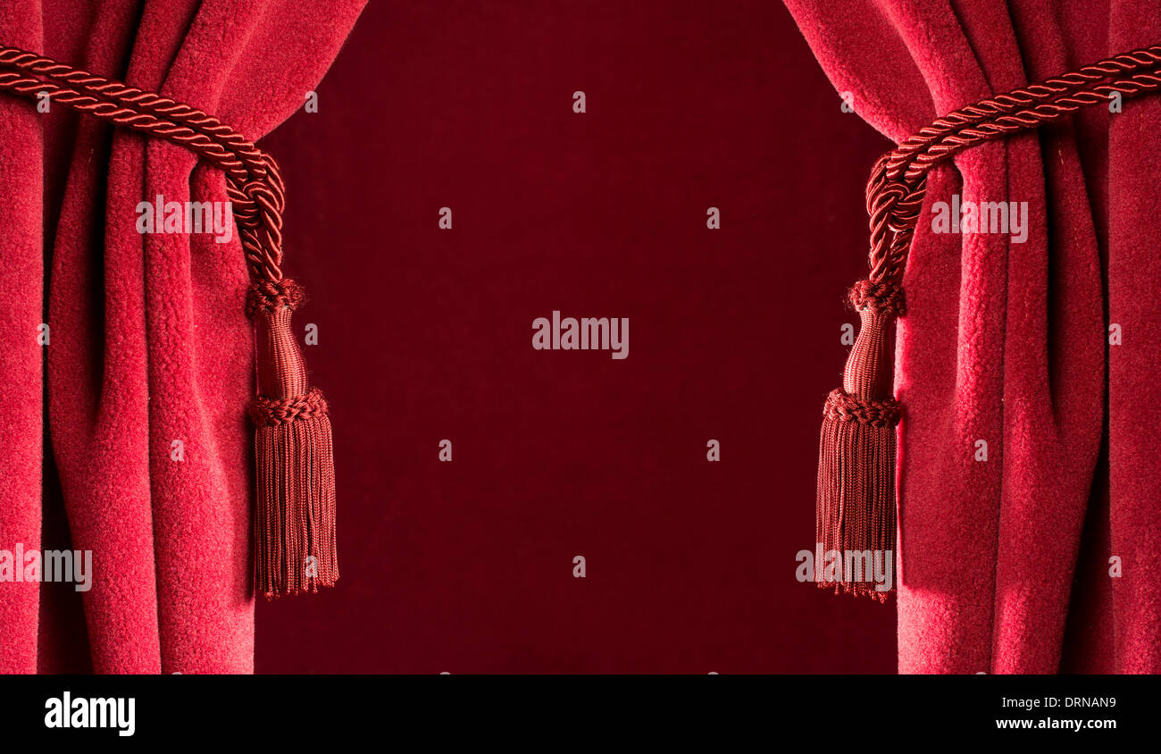Teatro rossi tendaggi e nappe di colore rosso Foto Stock