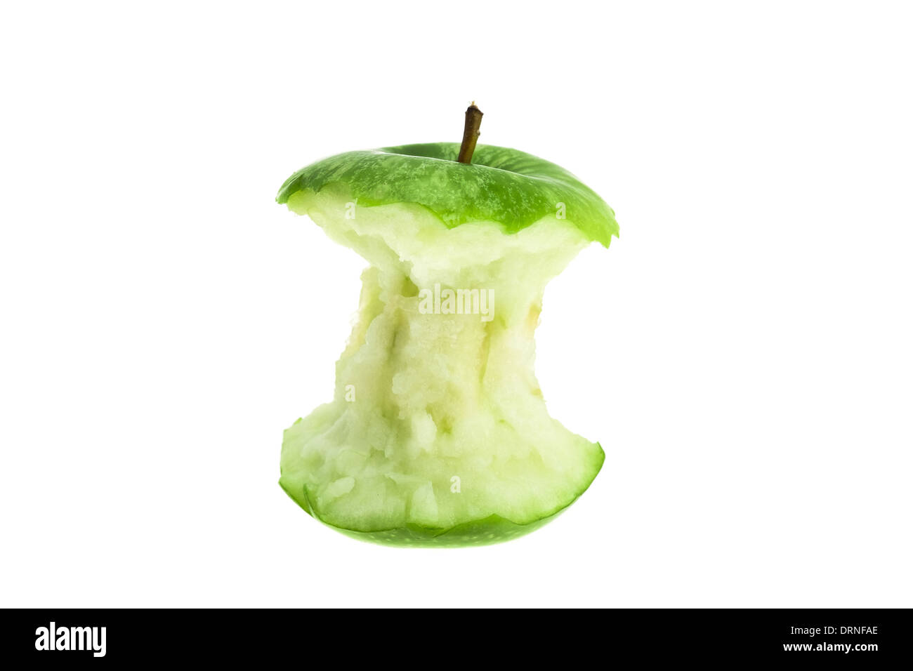 Una mangiata green apple core - studio shot con uno sfondo bianco Foto Stock