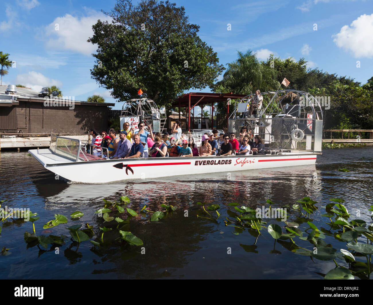 I turisti su un Airboat viaggio nel Parco nazionale delle Everglades, Florida, Stati Uniti d'America Foto Stock