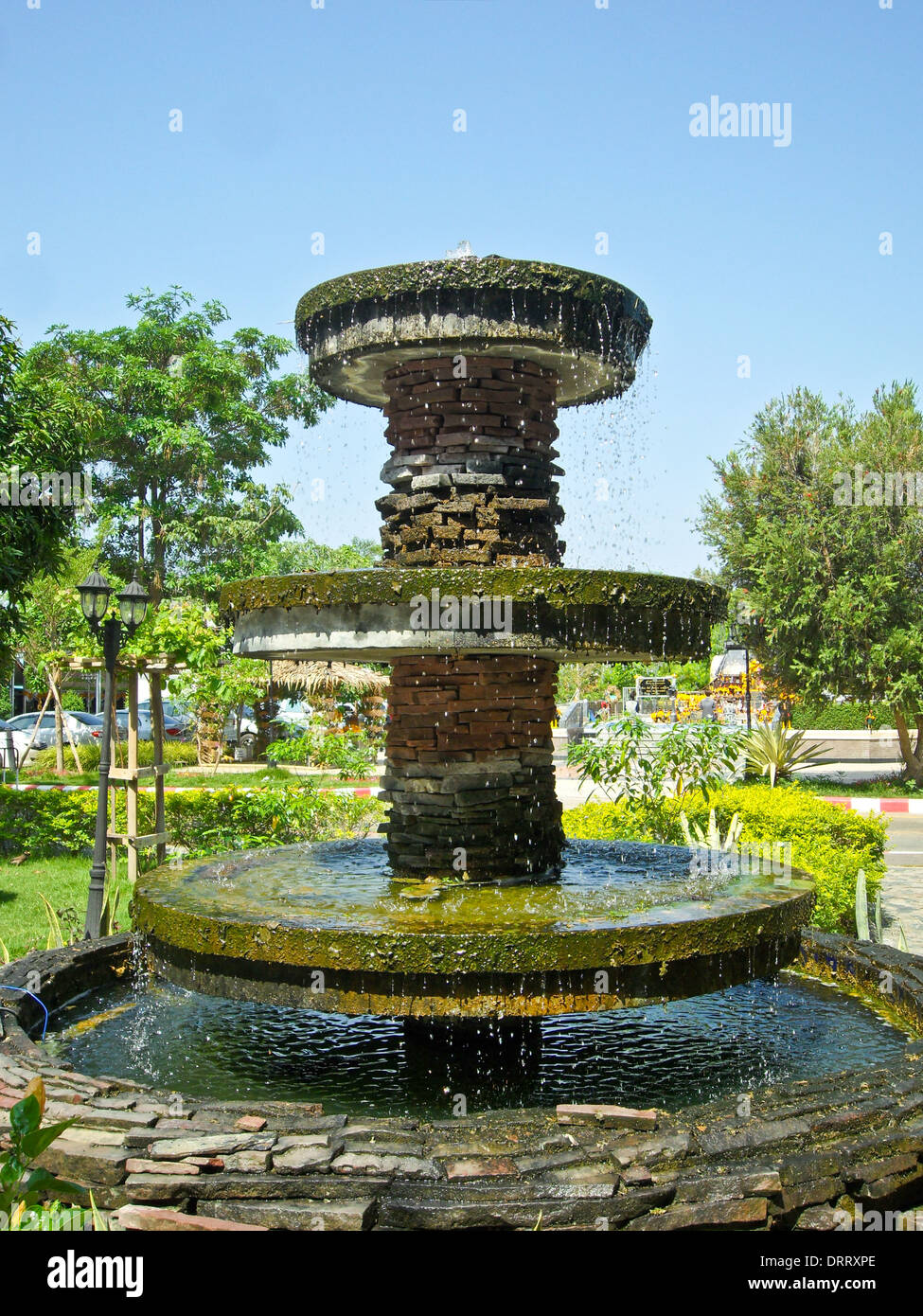 Fontana nel parco di vacanze in Thailandia Foto Stock