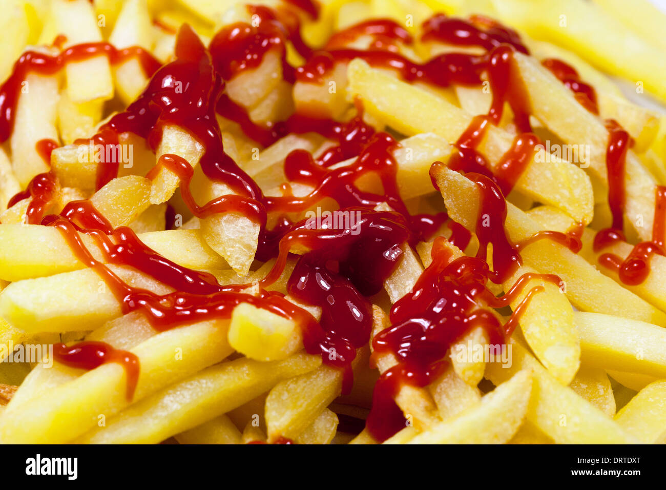 Patate fritte con ketchup Foto Stock