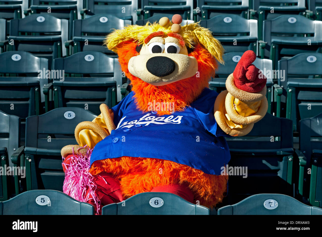 Orbita (isotopi squadra di baseball mascotte) nelle sedi dello stadio di lampeggiare No.1 segno, isotopi Park, Albuquerque, Nuovo Messico Foto Stock