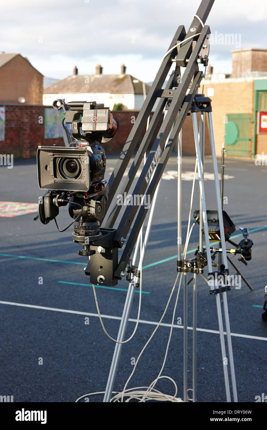 Canon EOS C film tv fotocamera su stativo a braccio Foto stock - Alamy