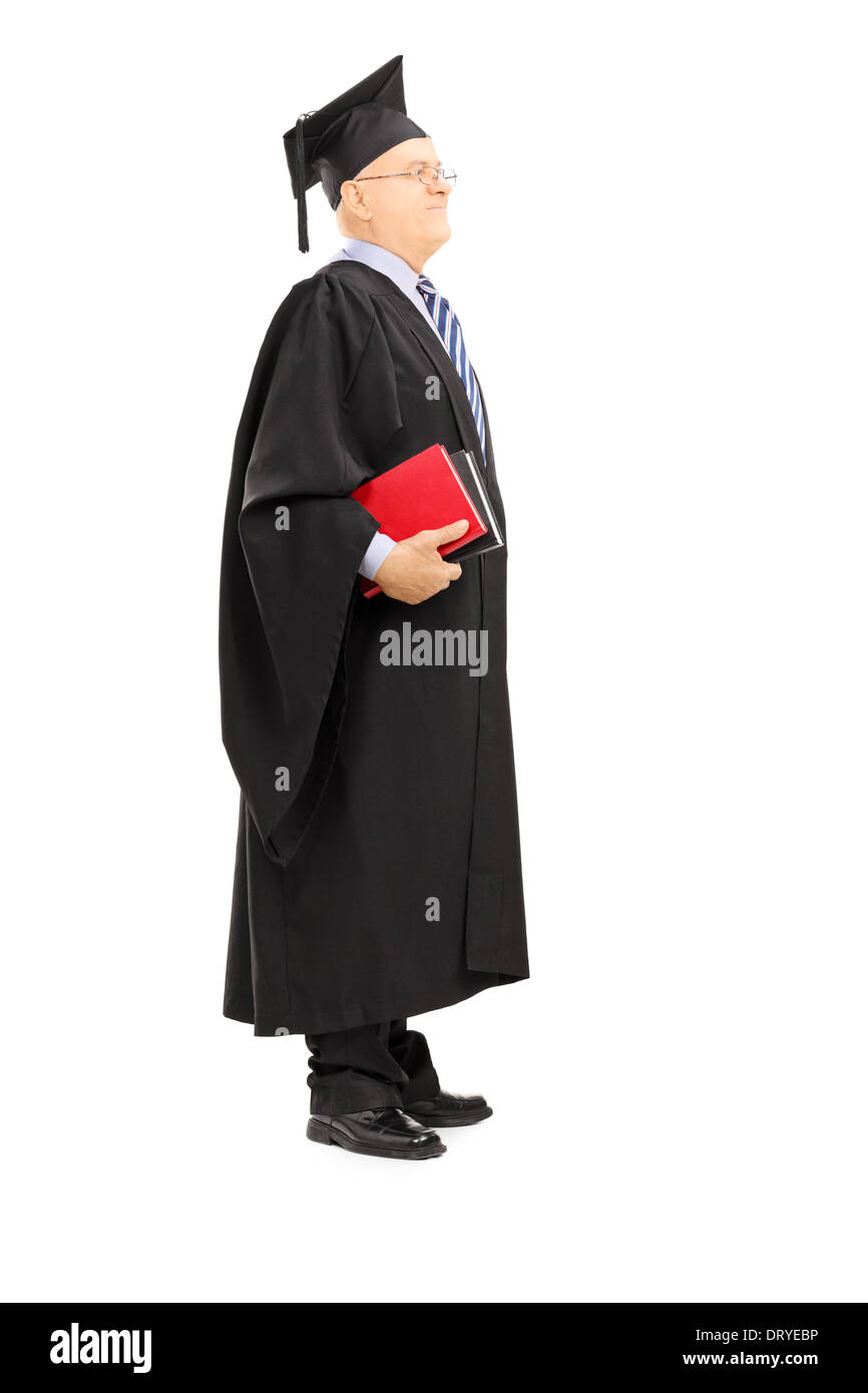 A piena lunghezza Ritratto di un maturo professore universitario con libri Foto Stock